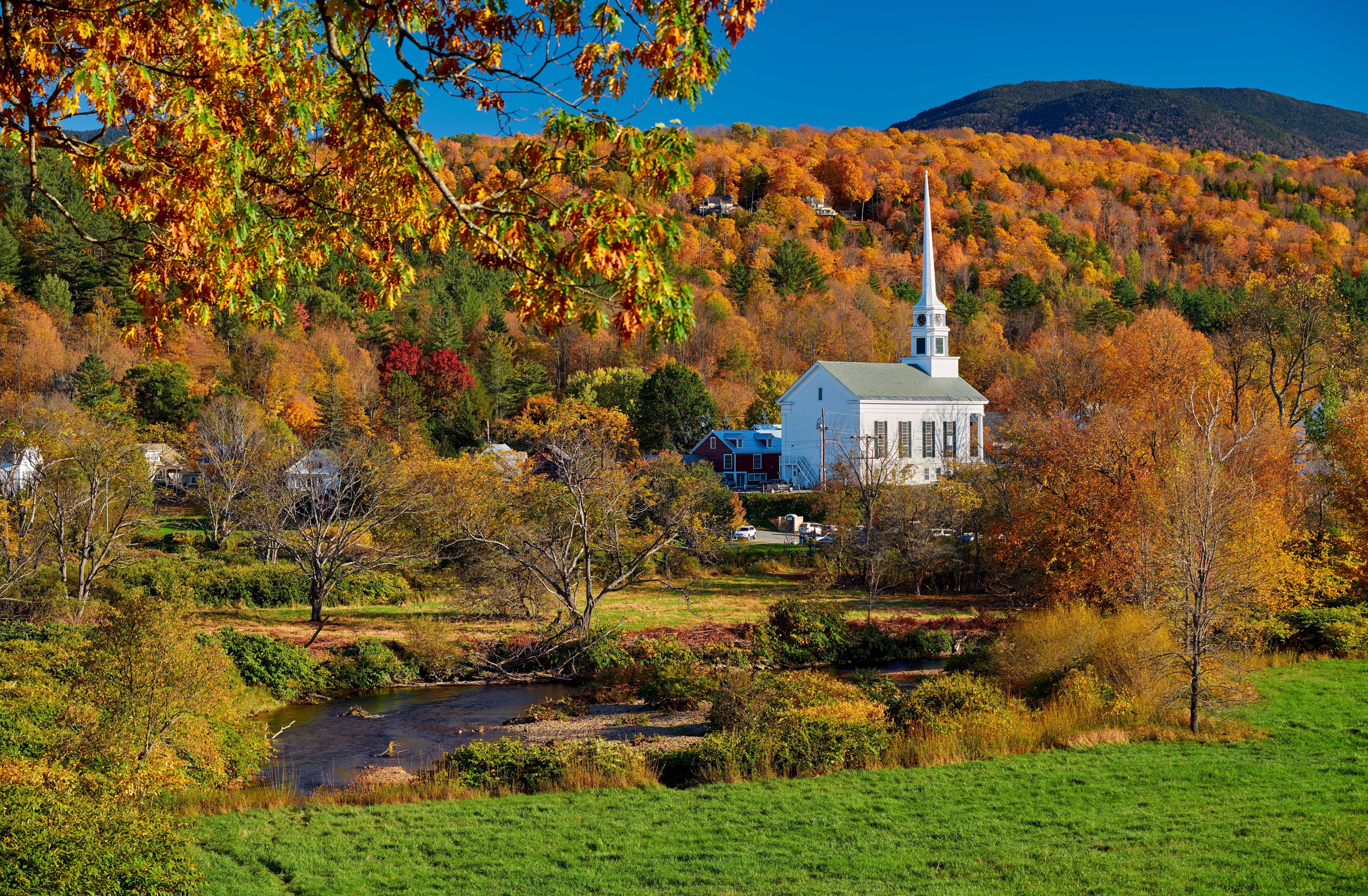 Iconic New England church in Stowe in autumn